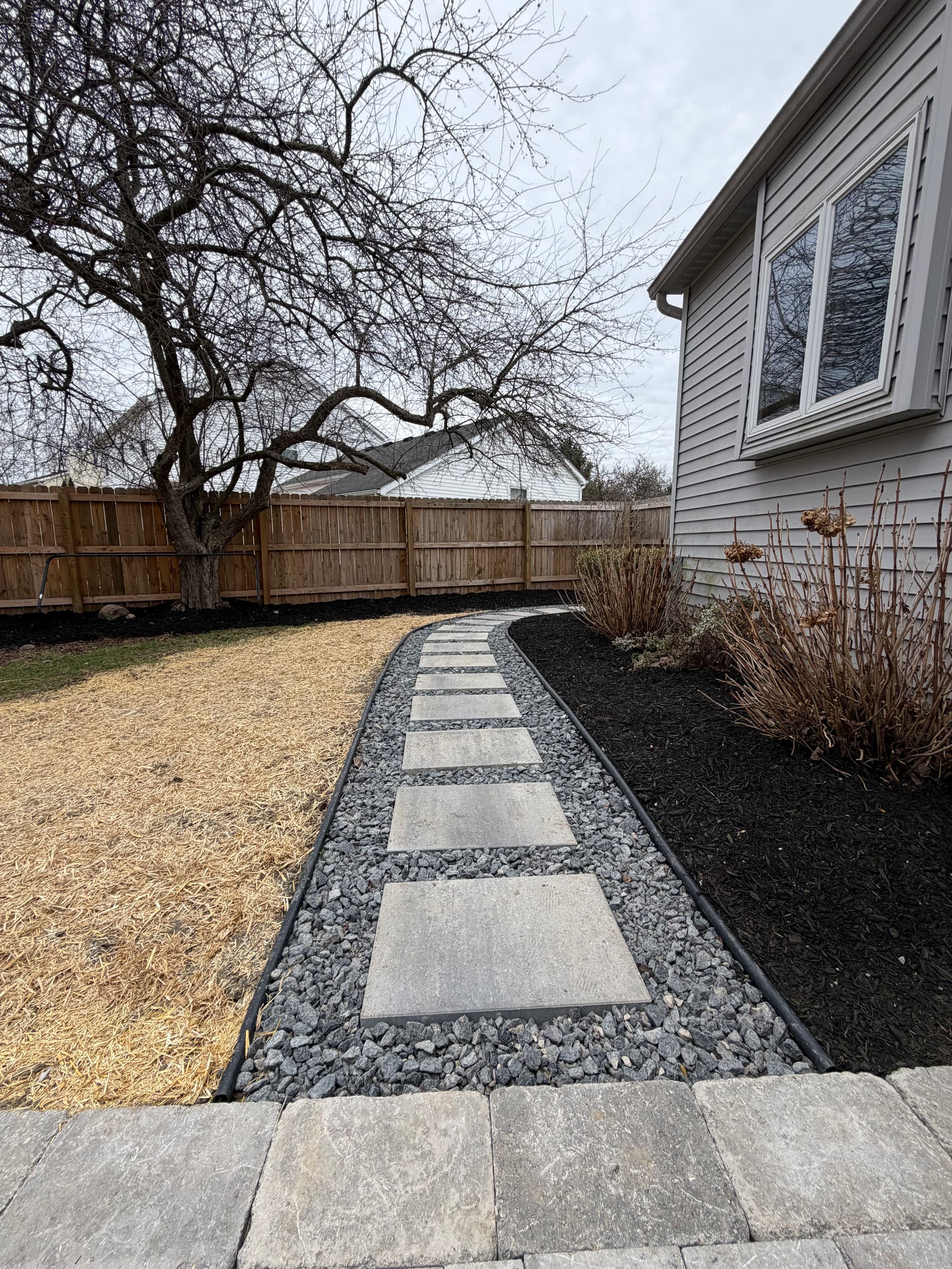 Unilock Brussel Block Patio and Stepping Stone Walkway in Brighton image